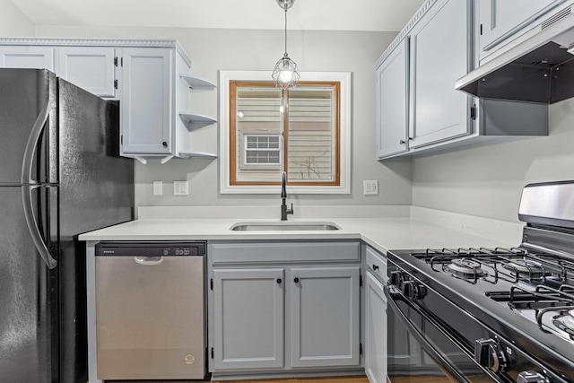 kitchen with black appliances, decorative light fixtures, gray cabinets, and sink