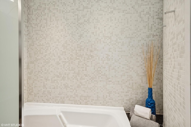 bathroom with a bathing tub