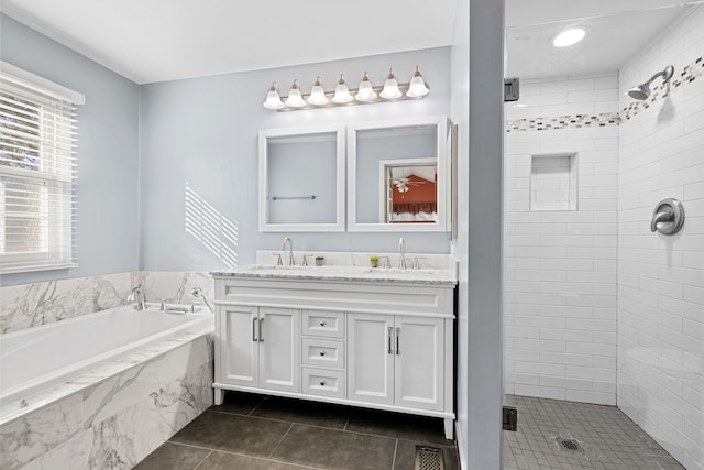 bathroom featuring vanity, tile patterned flooring, and independent shower and bath