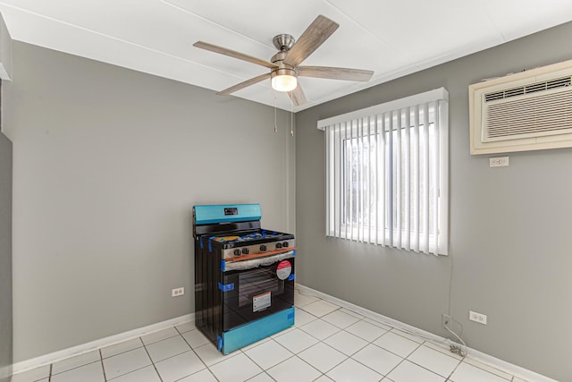 misc room with a wall mounted air conditioner, ceiling fan, and light tile patterned flooring