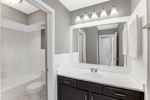 full bathroom with tile patterned floors, vanity, bathing tub / shower combination, and toilet