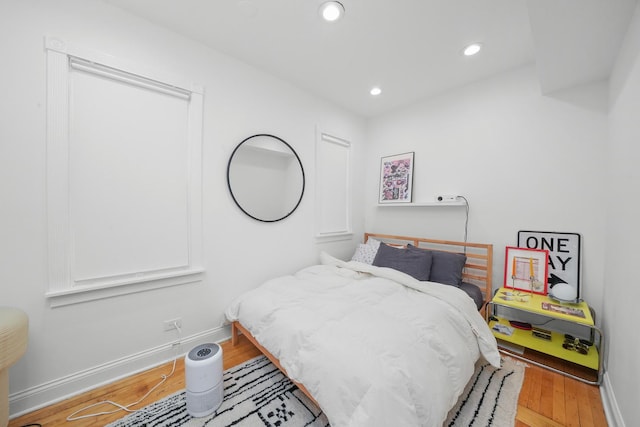 bedroom featuring wood-type flooring