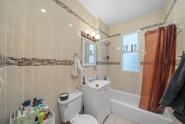 full bathroom featuring vanity, tile patterned floors, toilet, tile walls, and shower / tub combo with curtain