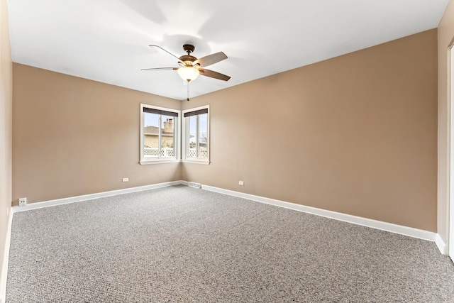 carpeted empty room with ceiling fan