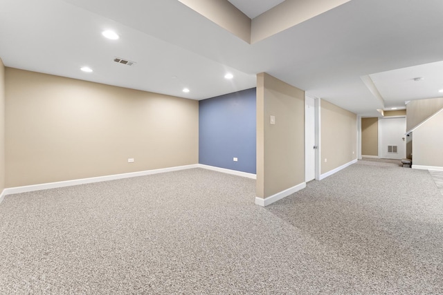 basement with carpet flooring