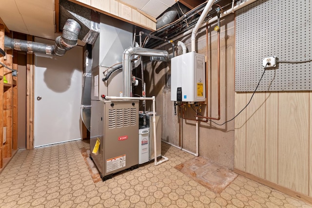 utility room with tankless water heater