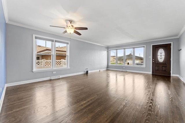 unfurnished living room with dark hardwood / wood-style floors, ceiling fan, and crown molding