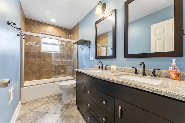 full bathroom with toilet, vanity, and combined bath / shower with glass door