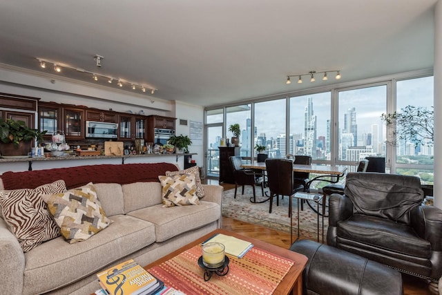 living room featuring hardwood / wood-style floors and expansive windows