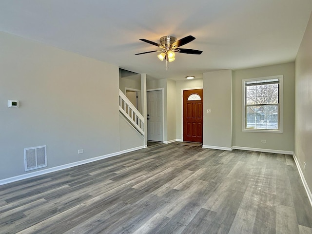 foyer entrance featuring ceiling fan and wood-type flooring