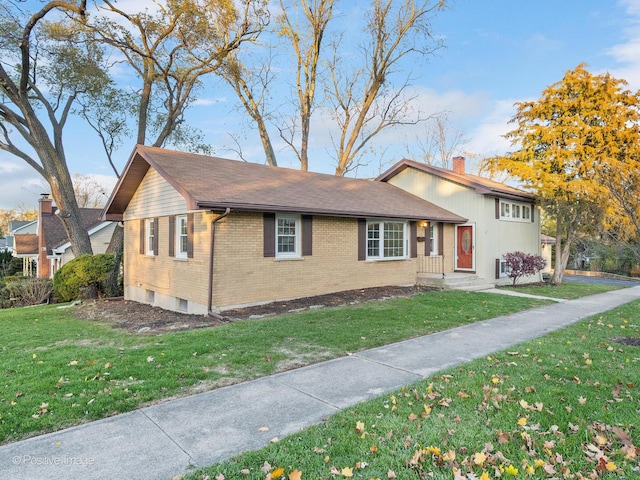 view of front of home with a front lawn