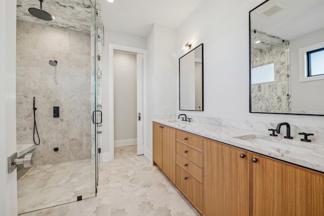 bathroom with vanity and an enclosed shower