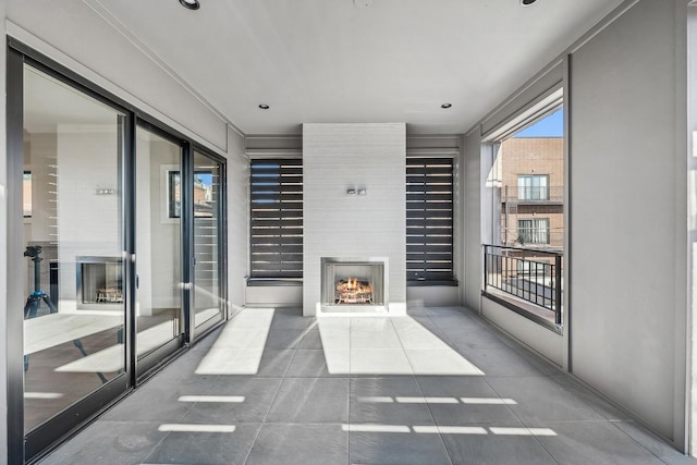 interior space featuring ornamental molding and tile patterned floors