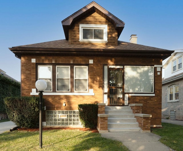 view of front of house with a front yard