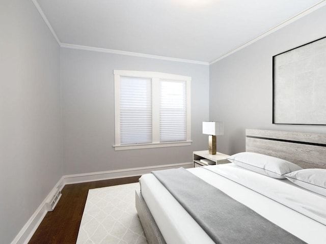 bedroom featuring dark hardwood / wood-style floors and crown molding