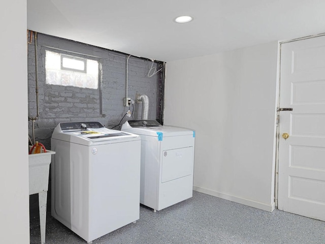 washroom featuring washer and dryer