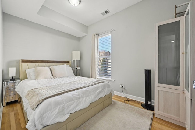 bedroom featuring light wood-type flooring