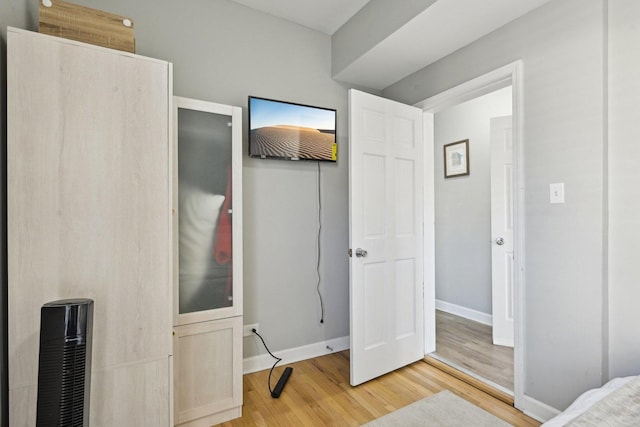 bedroom with light hardwood / wood-style flooring