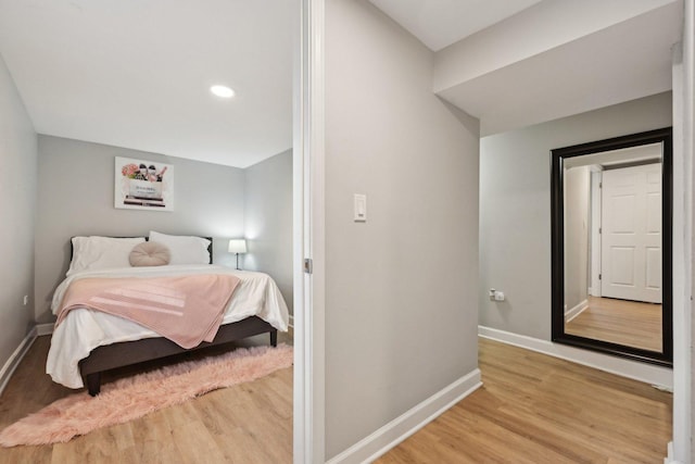 bedroom with light wood-type flooring