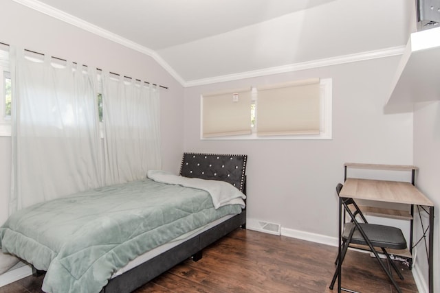 bedroom featuring dark hardwood / wood-style flooring, vaulted ceiling, and ornamental molding