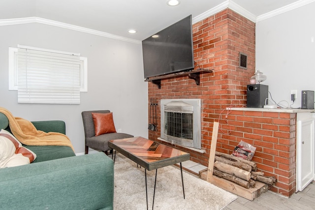 living room with light hardwood / wood-style flooring and ornamental molding