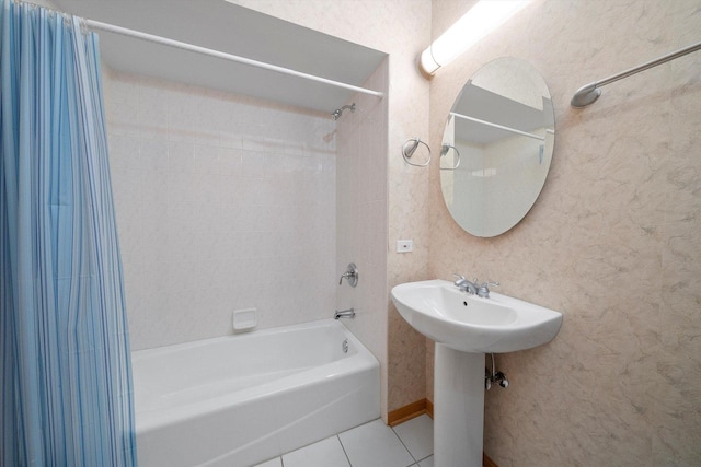 bathroom with tile patterned flooring and shower / bath combo