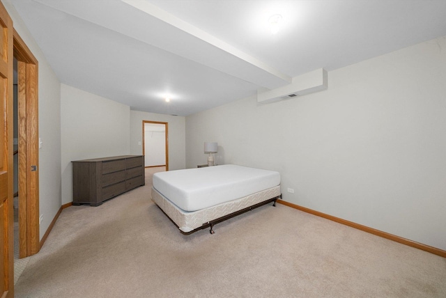 bedroom with light colored carpet