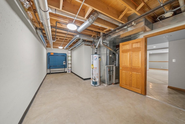 basement featuring gas water heater and heating unit