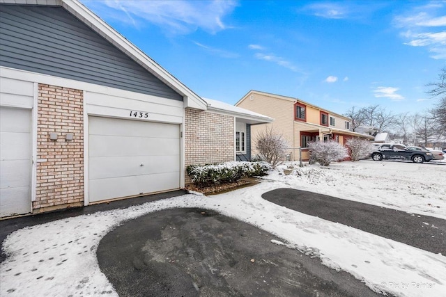 exterior space with a garage