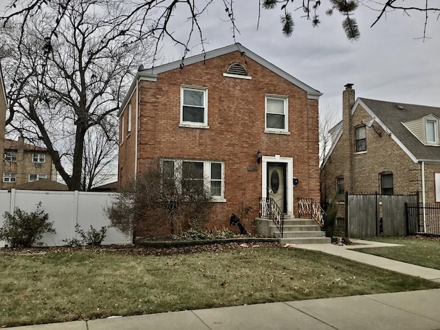 view of front of property featuring a front yard