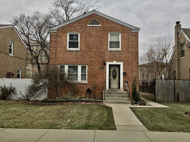 view of front of property featuring a front yard