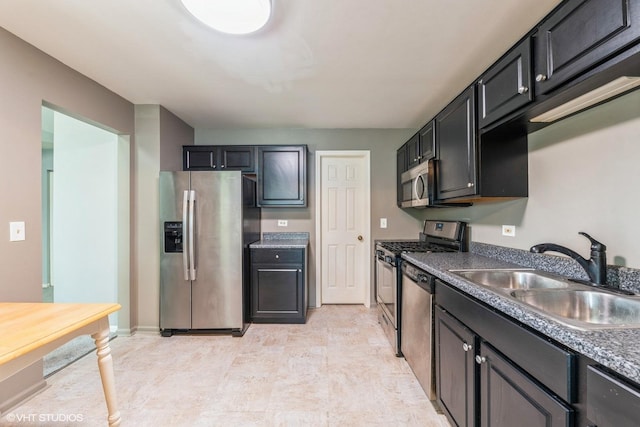 kitchen with sink and appliances with stainless steel finishes