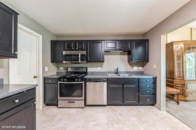 kitchen with appliances with stainless steel finishes and sink