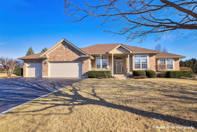 ranch-style home featuring a garage