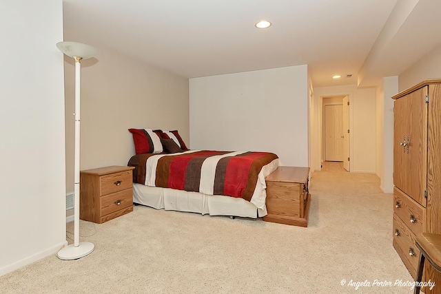 bedroom with light carpet