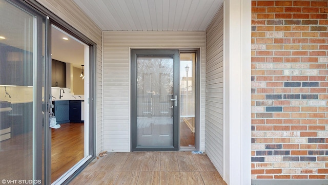 doorway to property featuring sink