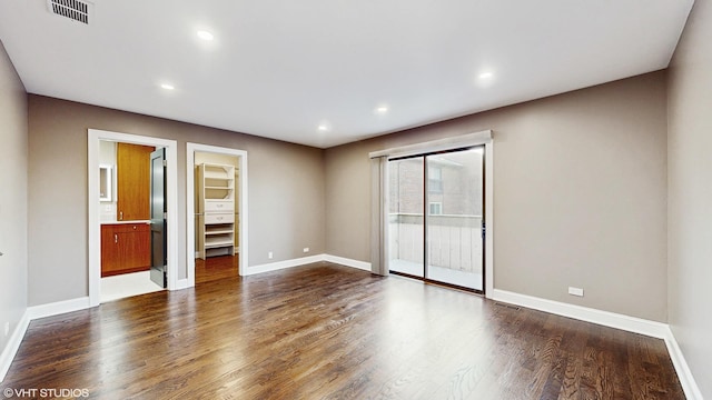 empty room featuring hardwood / wood-style floors