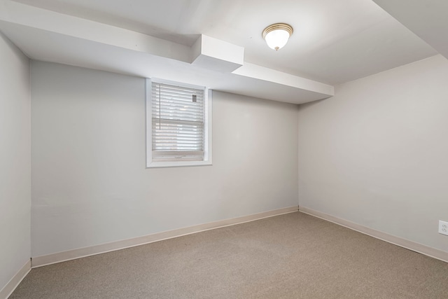 basement with carpet flooring