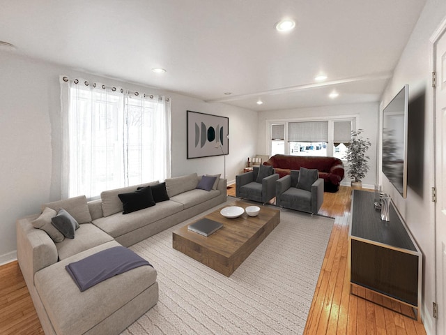 living room with light hardwood / wood-style flooring