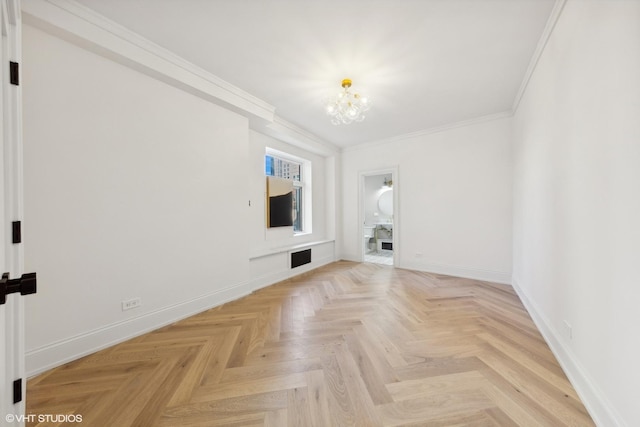 unfurnished living room featuring a chandelier, crown molding, and light parquet floors