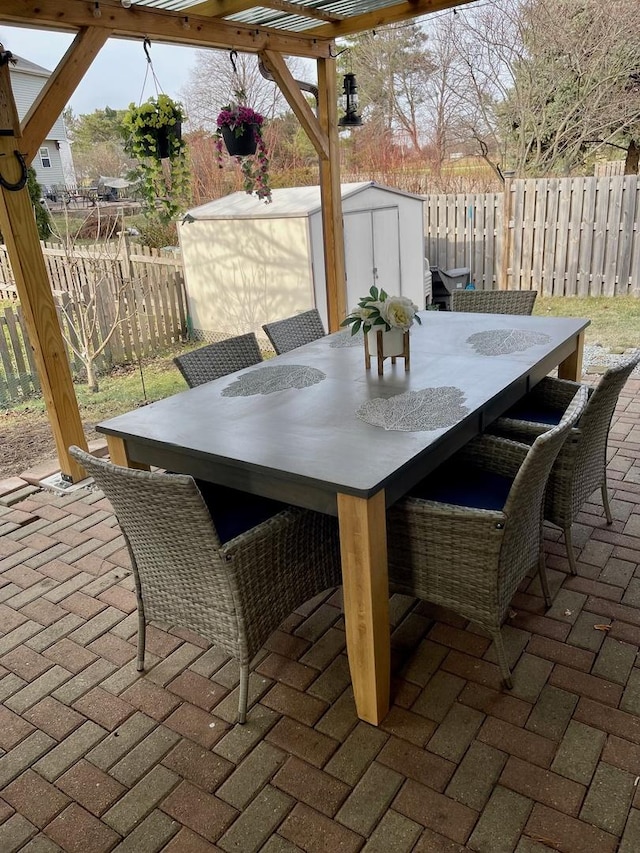 view of patio with a storage shed