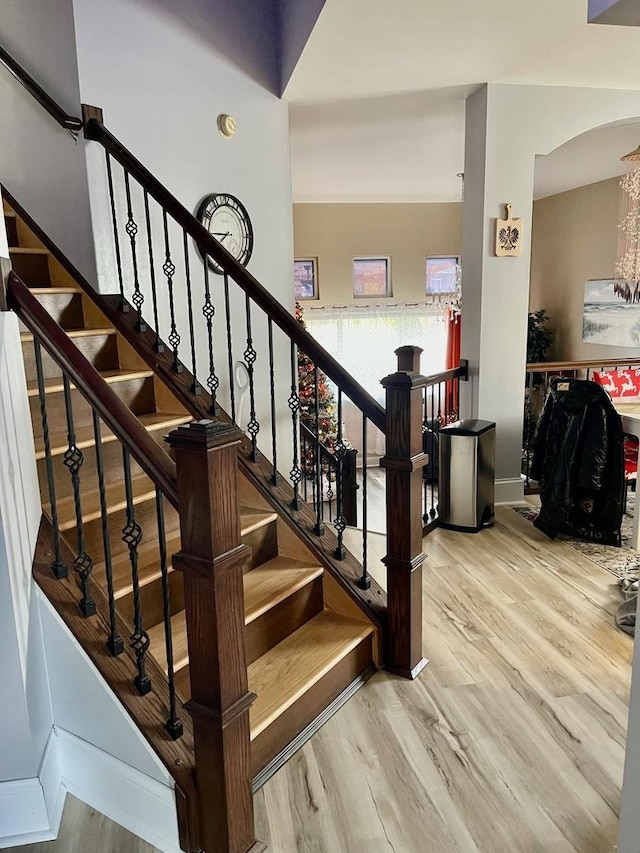 stairway featuring hardwood / wood-style floors