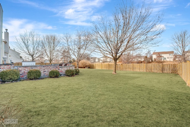 view of yard with fence