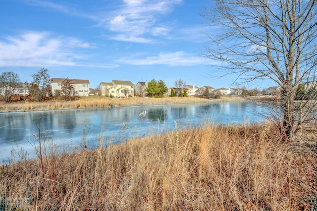 view of water feature with a residential view