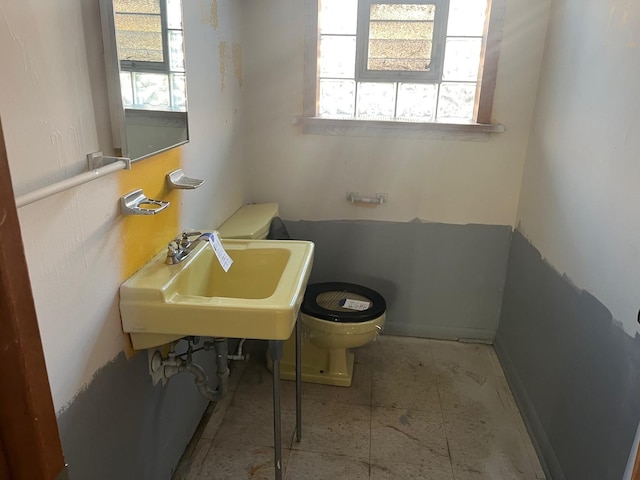 bathroom with toilet and sink