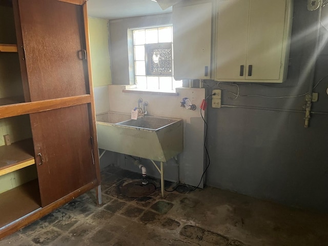 laundry area with sink