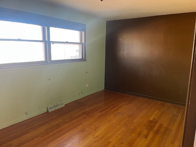 empty room featuring light hardwood / wood-style flooring