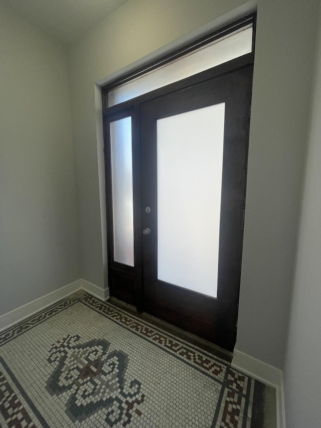 view of tiled entrance foyer