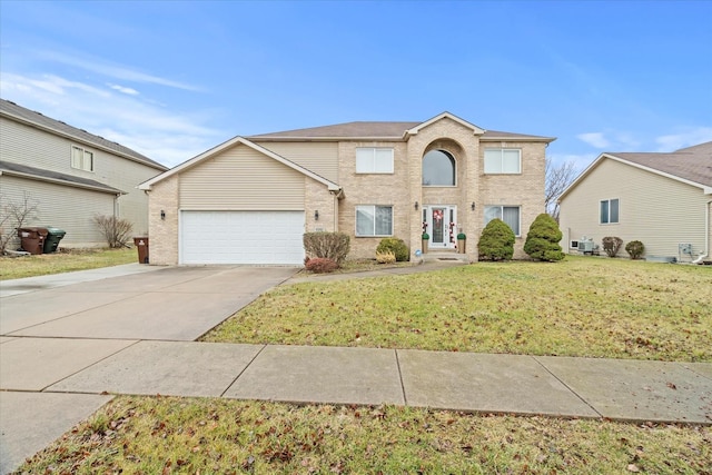 front facade with a garage and a front lawn