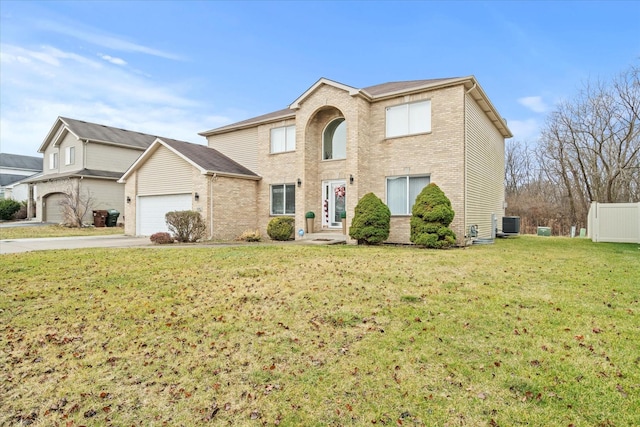 view of front property featuring a front yard and central AC